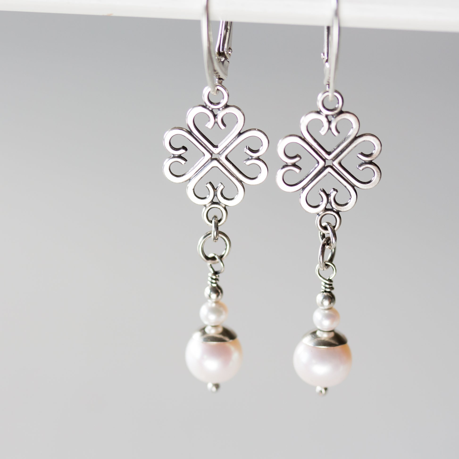 Long Elegant Pearl Earrings, Four Leaf Clover and White Pearl Dangle, Sterling Silver - jewelry by CookOnStrike