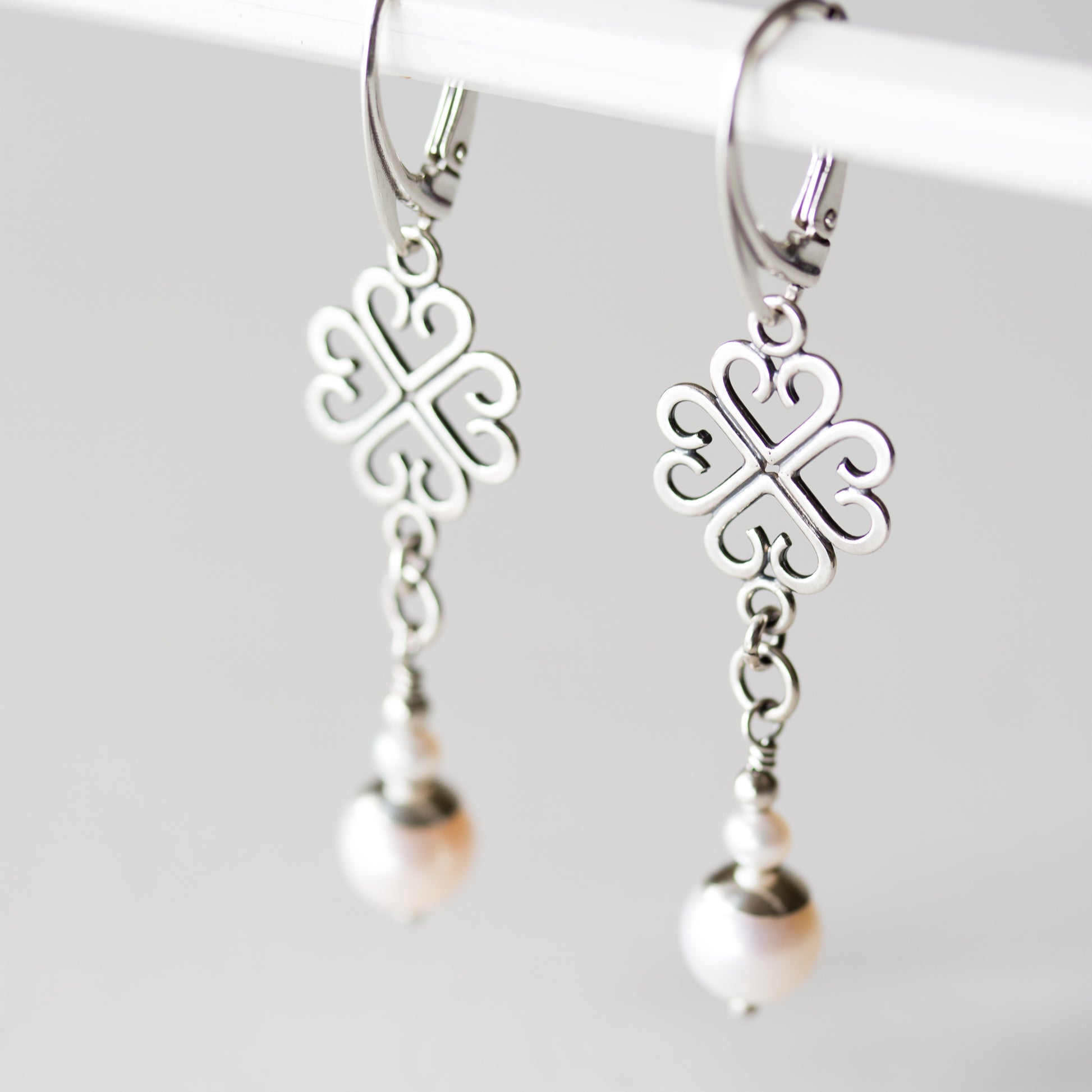 Long Elegant Pearl Earrings, Four Leaf Clover and White Pearl Dangle, Sterling Silver - jewelry by CookOnStrike