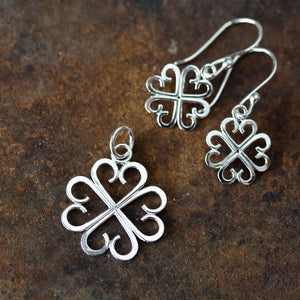 Good Luck Pendant, Small Four Leaf Clover Made of Silver Hearts - jewelry by CookOnStrike