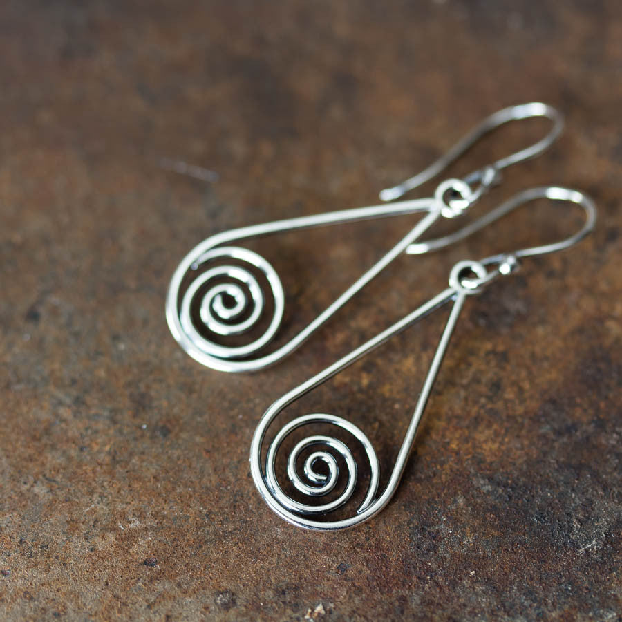 Long silver teardrop earrings with spirals inside - jewelry by CookOnStrike
