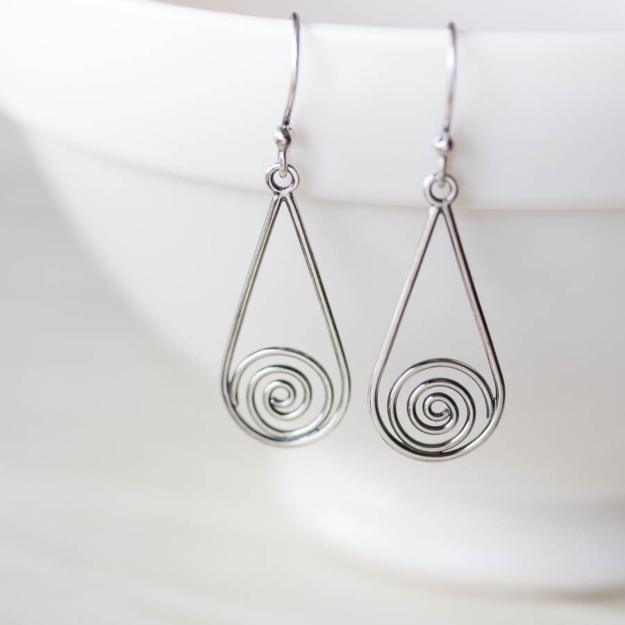 Long silver teardrop earrings with spirals inside - jewelry by CookOnStrike