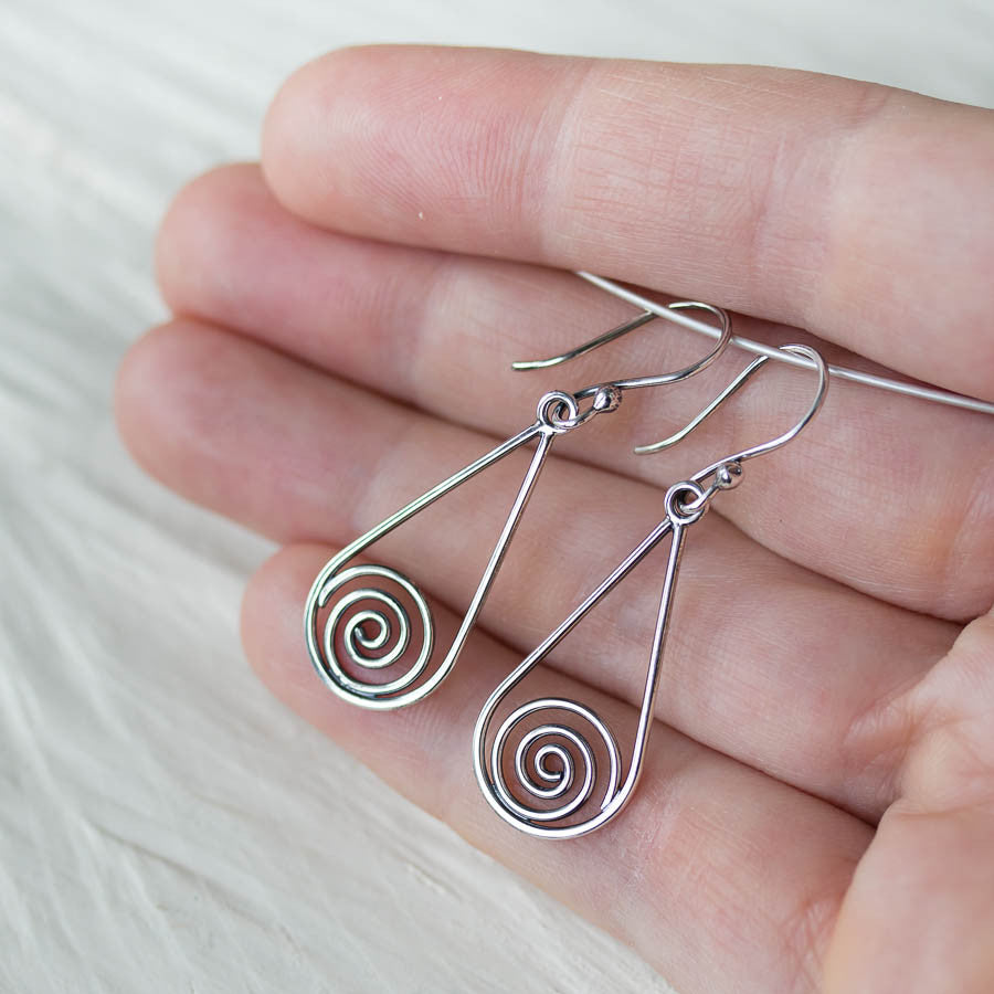 Long silver teardrop earrings with spirals inside - jewelry by CookOnStrike