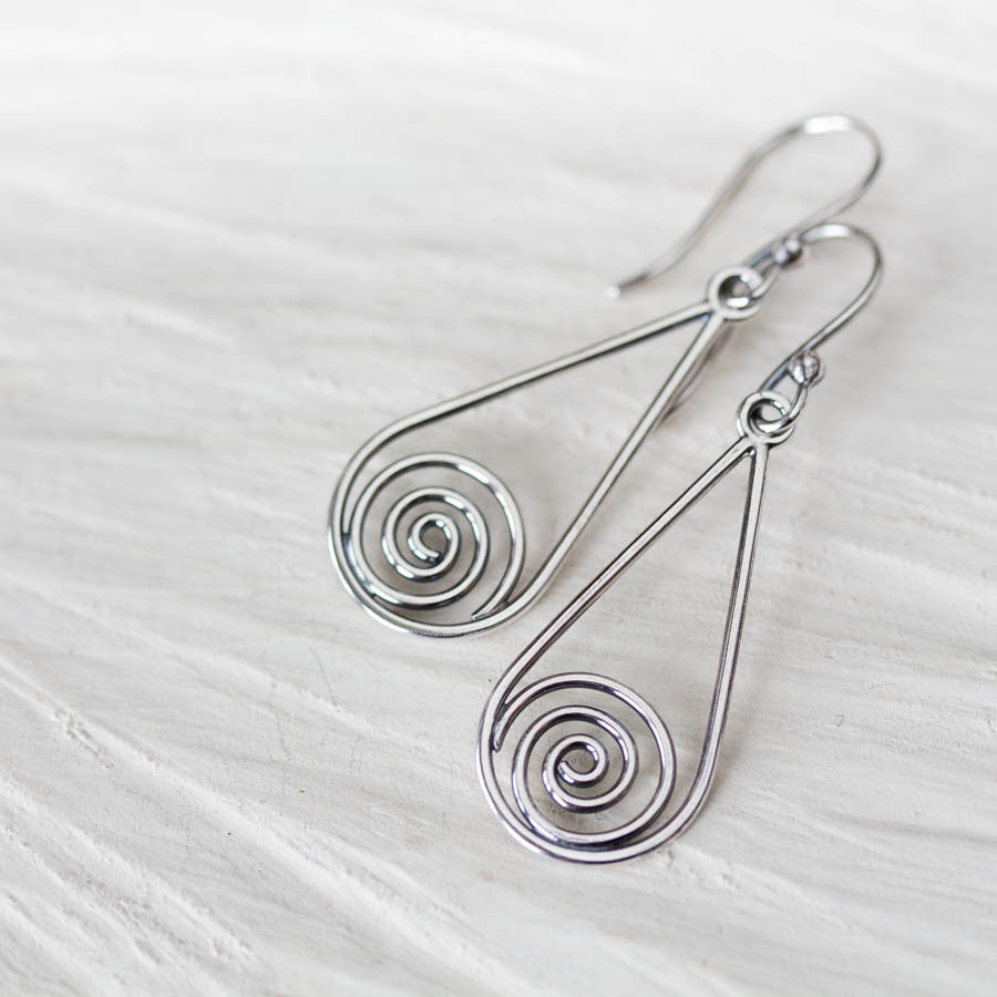 Long silver teardrop earrings with spirals inside - jewelry by CookOnStrike