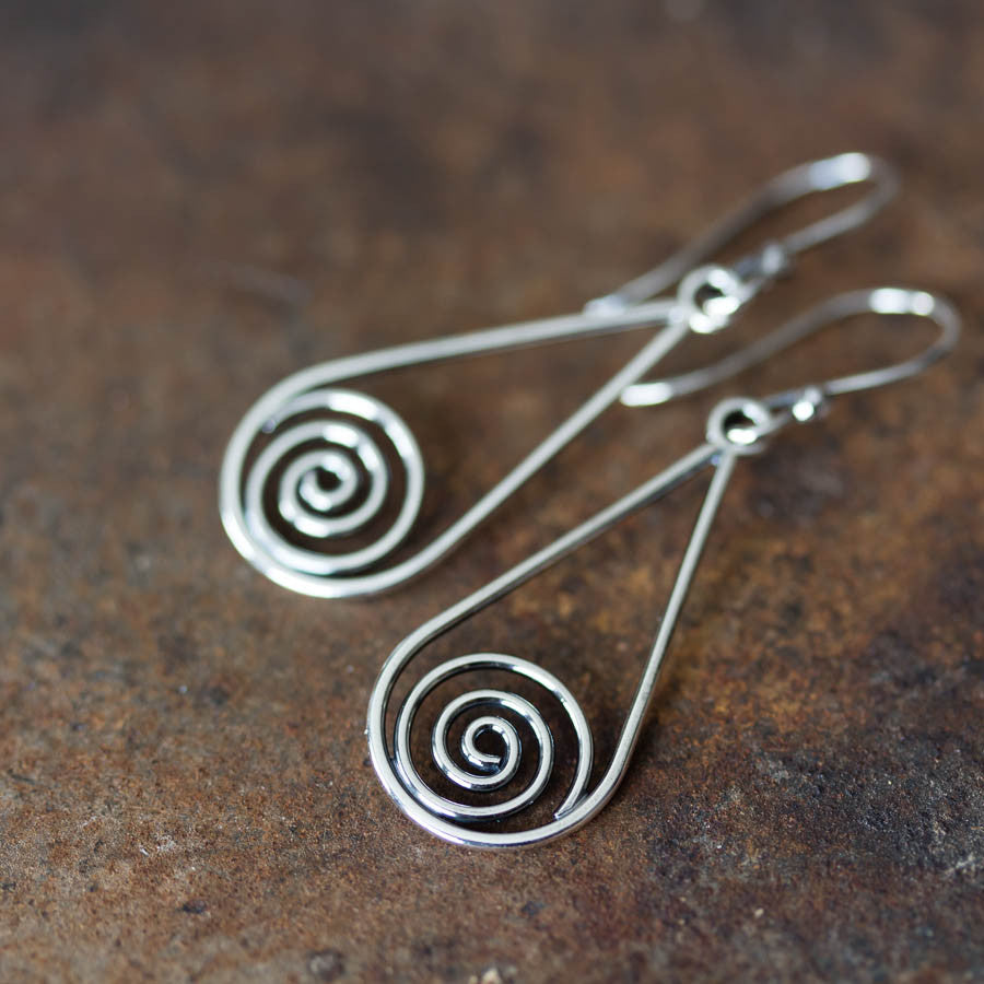 Long silver teardrop earrings with spirals inside - jewelry by CookOnStrike