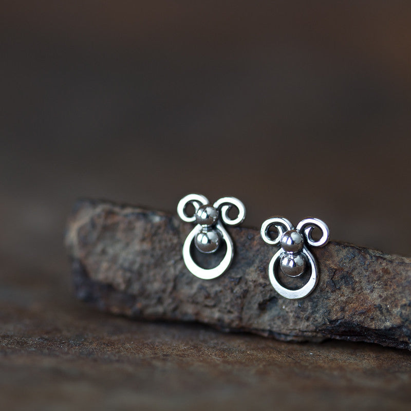 Tiny unusual artisan stud earrings abstract silver shapes