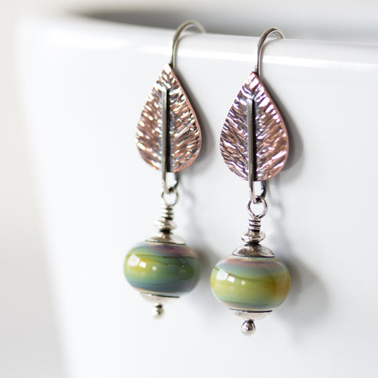Pastel Green Earrings, hammered copper leaf with lampwork beads - jewelry by CookOnStrike