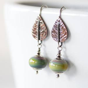 Pastel Green Earrings, hammered copper leaf with lampwork beads - jewelry by CookOnStrike