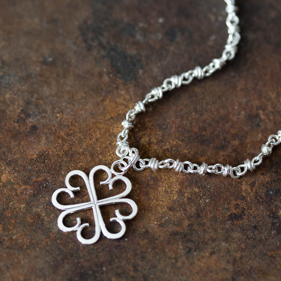Good Luck Pendant, Small Four Leaf Clover Made of Silver Hearts - jewelry by CookOnStrike