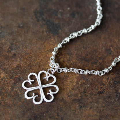 Good Luck Pendant, Small Four Leaf Clover Made of Silver Hearts - jewelry by CookOnStrike