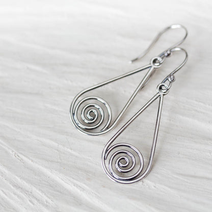 Long silver teardrop earrings with spirals inside - jewelry by CookOnStrike