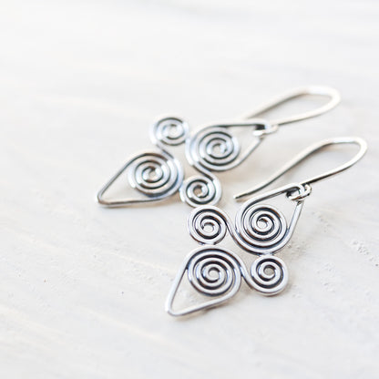 Interconnected Celtic spiral earrings, Handcrafted Small Silver Earrings - jewelry by CookOnStrike