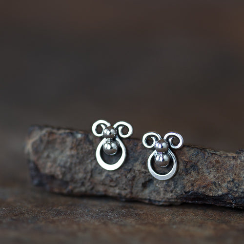 Tiny unusual artisan stud earrings, abstract silver shapes - jewelry by CookOnStrike