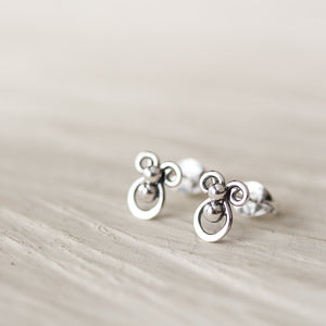 Tiny unusual artisan stud earrings, abstract silver shapes - jewelry by CookOnStrike